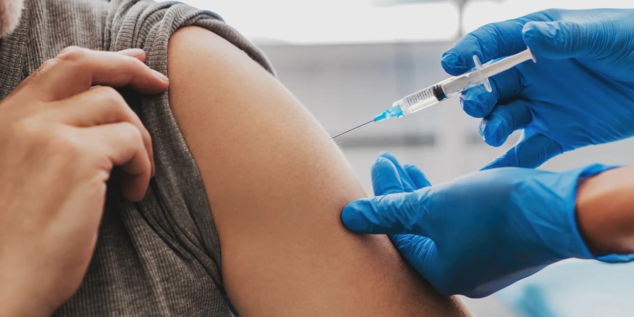 Person receiving vaccination
