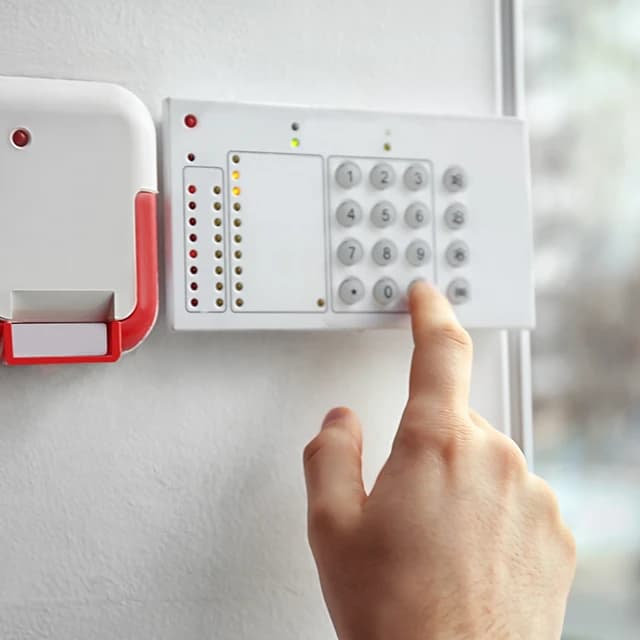 Entering code on alarm system