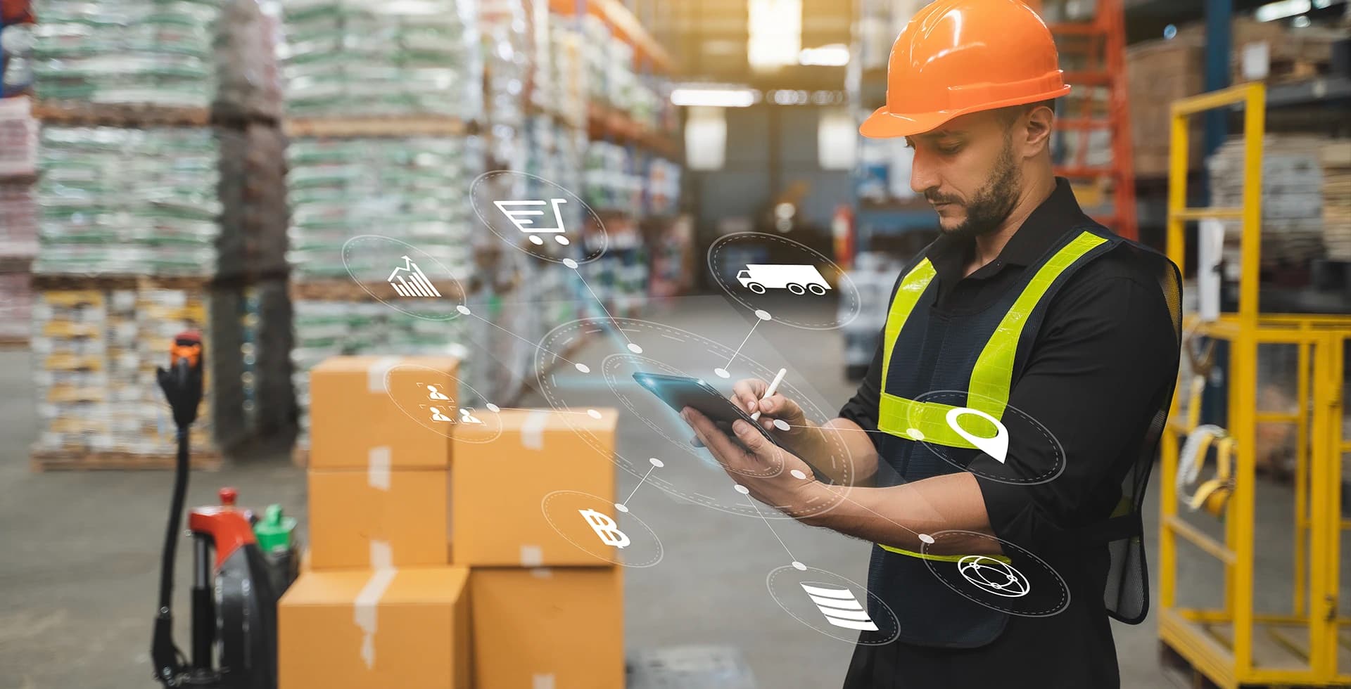 Worker using tablet in warehouse