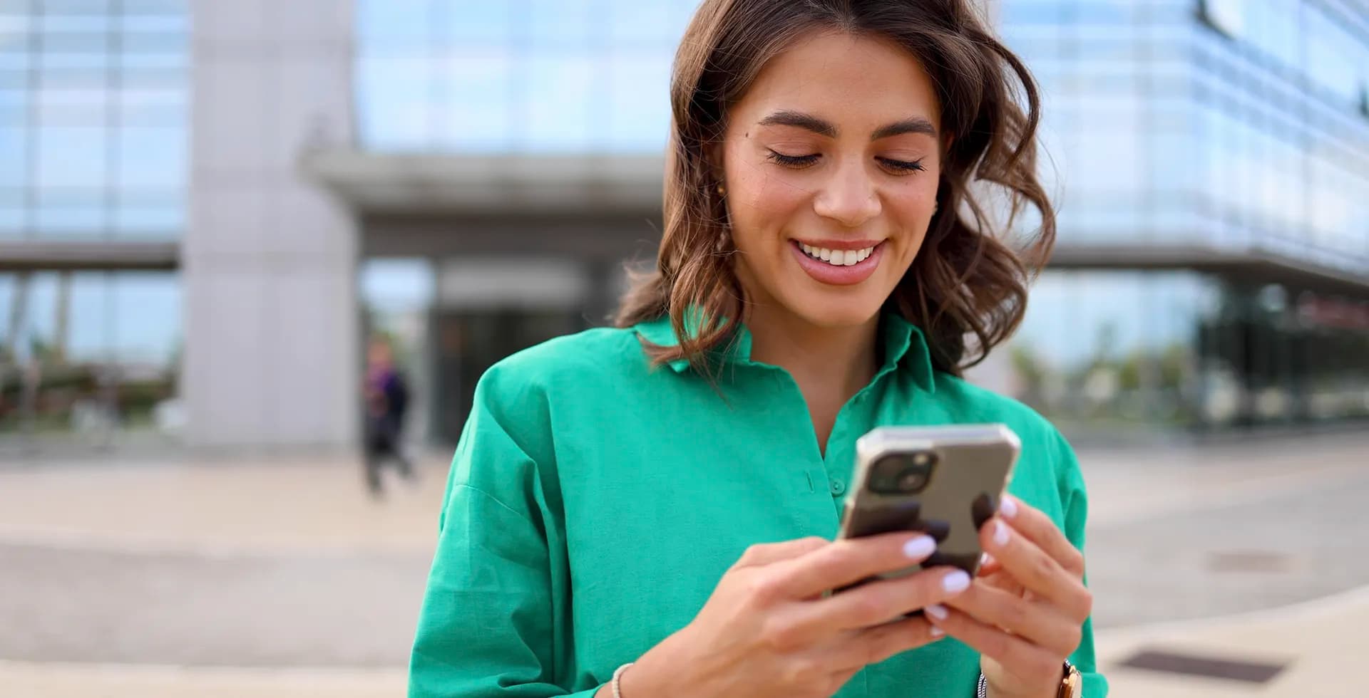 Photo of young businesswoman using a smartphone
