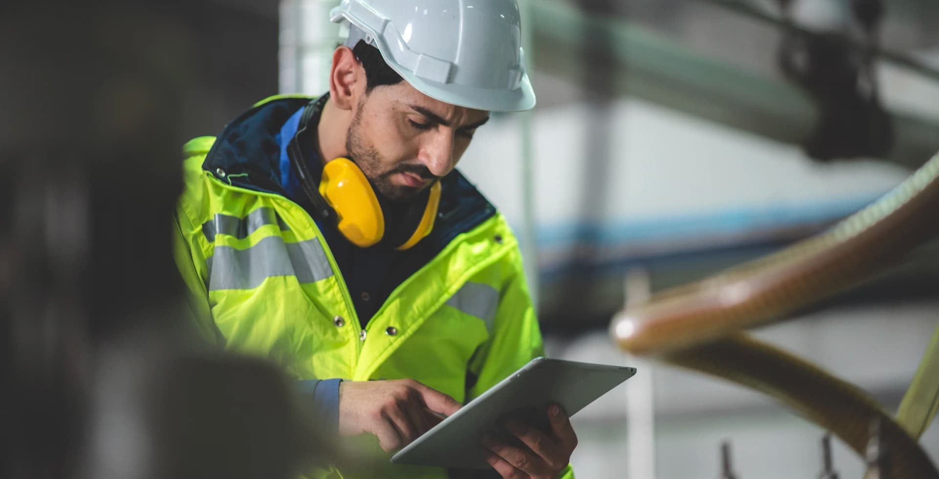 Construction worker using tablet